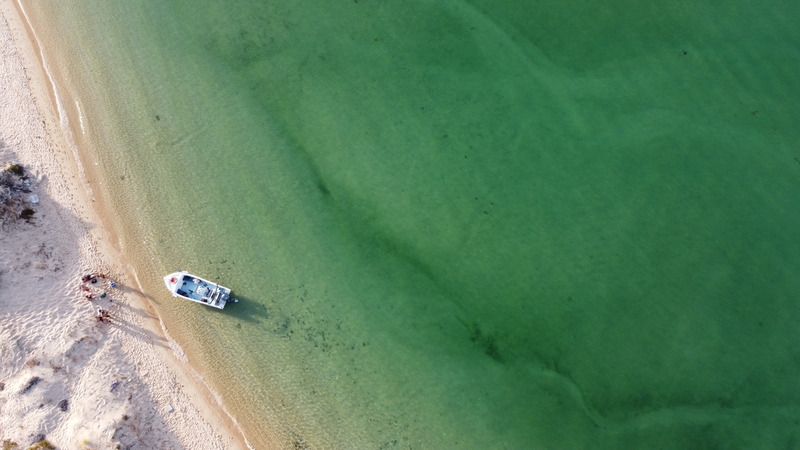 deserta island faro drone view during a boat trip
